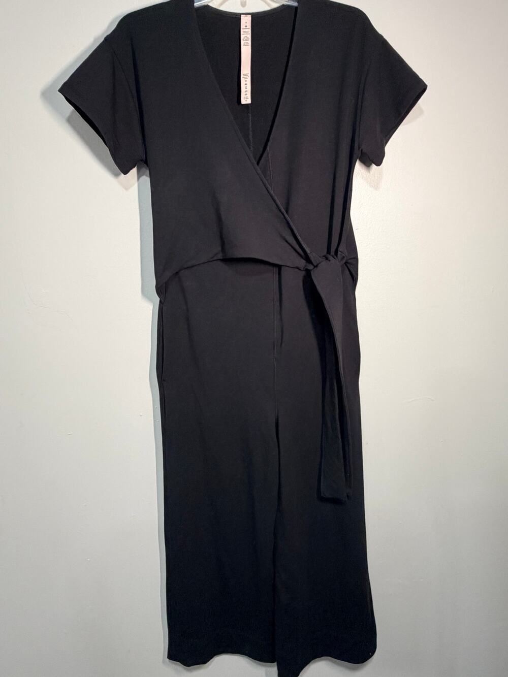 Lululemon It’s a Tie Jumpsuit Black Size 4 NWOT Wrap Modal French Terry